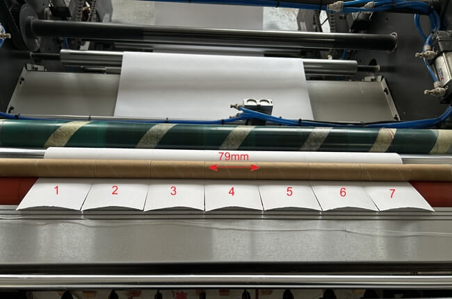 The 558mm width jumbo roll is cut into 7 rows